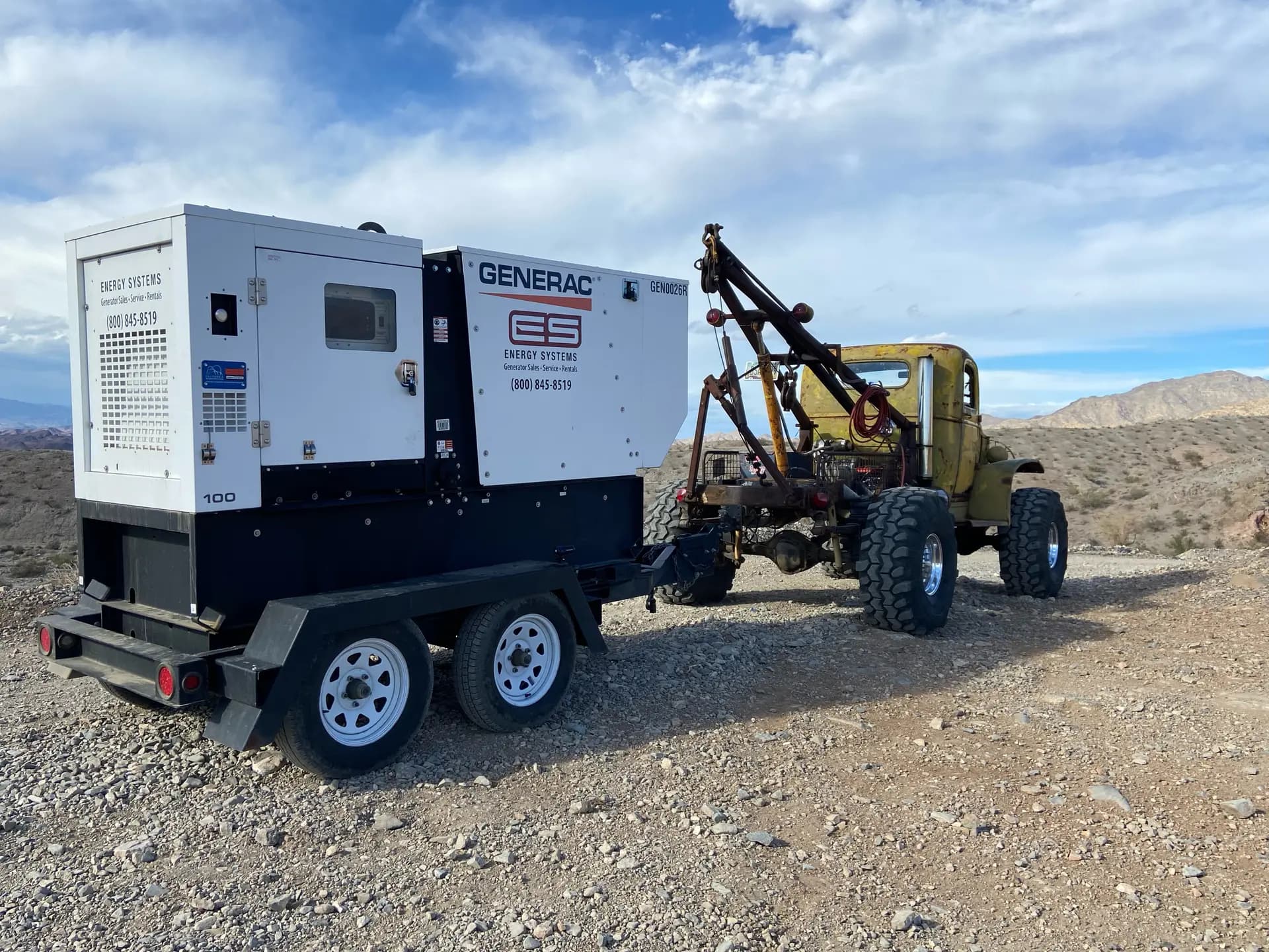 Mobile diesel generator rental units powering a construction job site with temporary power distribution equipment
